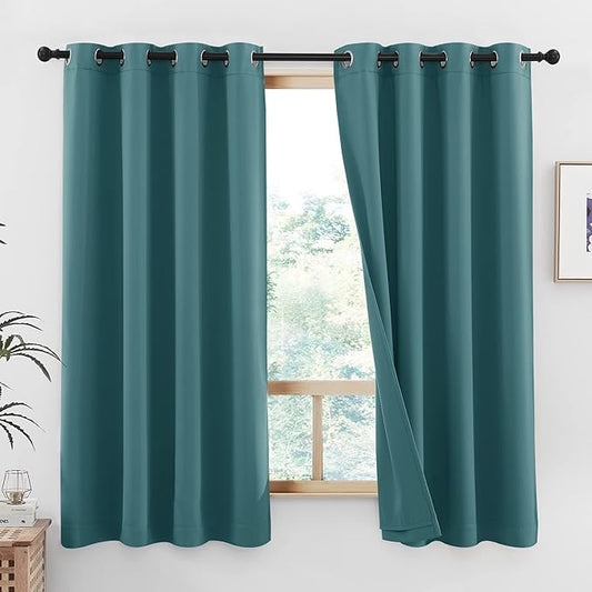 NICETOWN 100% Blackout Curtain Panels, Thermal Insulated Same Color Liner Drapes for Nursery, Noise Reducing Cold Blocking Drapes for Windows (Set of 2, Emerald Green, 52-inch Wide by 63-inch Long)