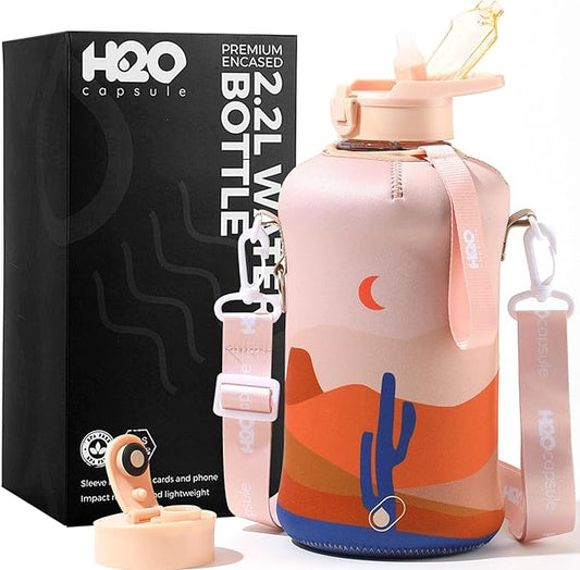 H2O Capsule 2.2L Half Gallon Water Bottle with Storage Sleeve and Covered Straw Lid – BPA Free Large Reusable Drink Container with Handle - Big Sports Jug, 2.2 Liter (74 Ounce)