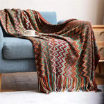 Hand-knitted blanket with pompom - Vignette | Couvertures Cosy