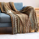 Hand-knitted blanket with pompom - Vignette | Couvertures Cosy
