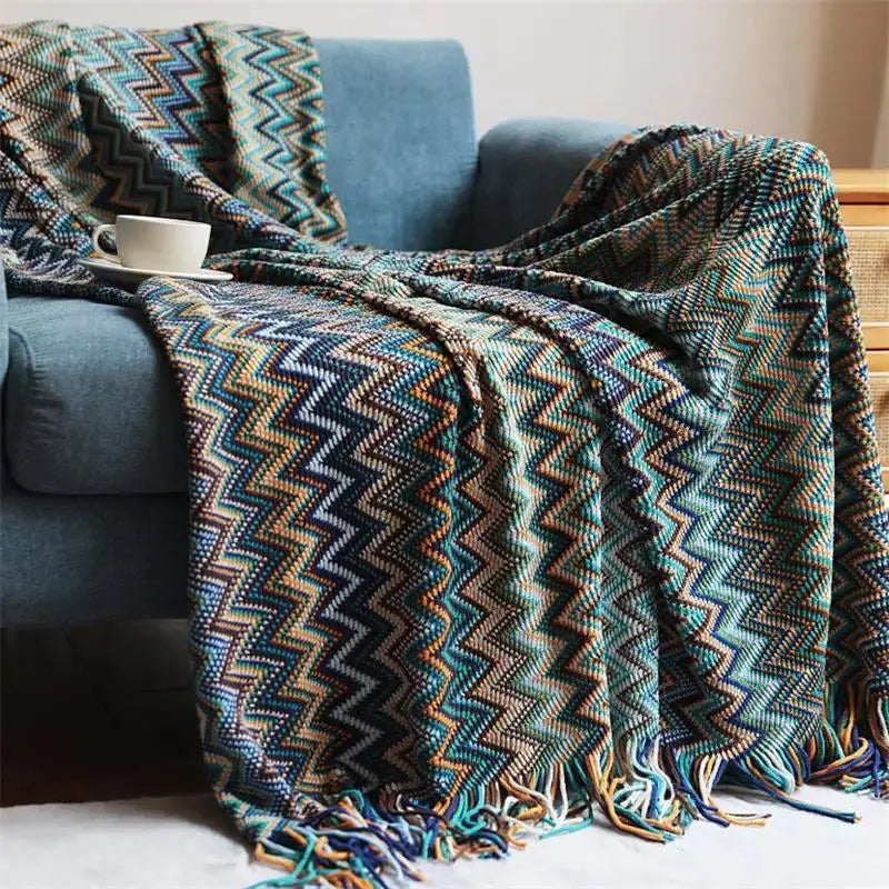 Couverture tricotée à la main avec pompon